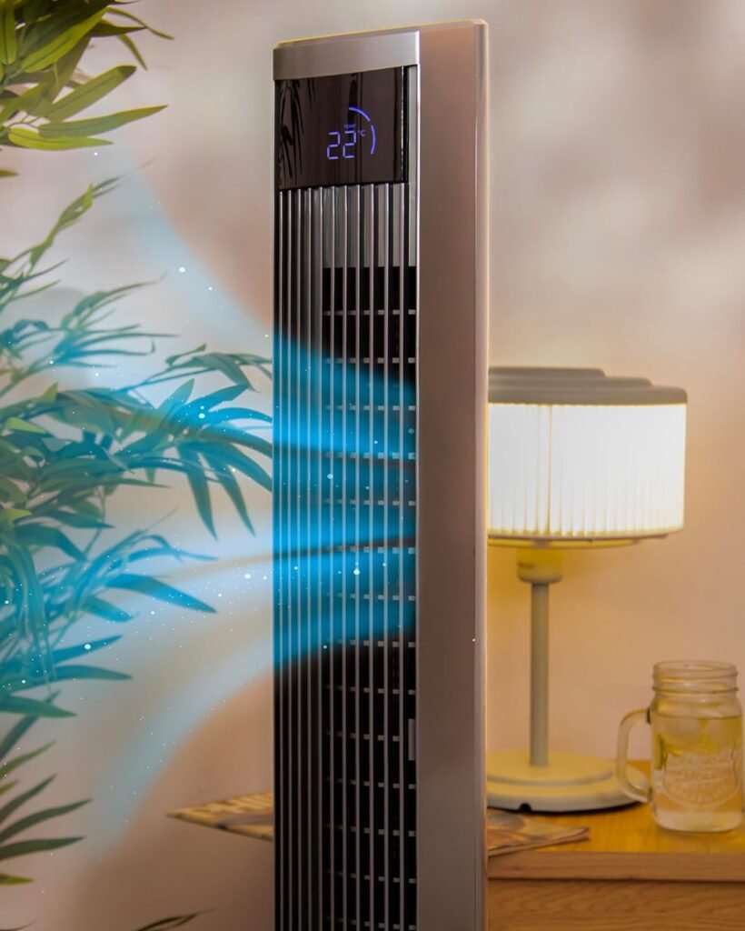 a tall tower with a digital display and a plant in front of it